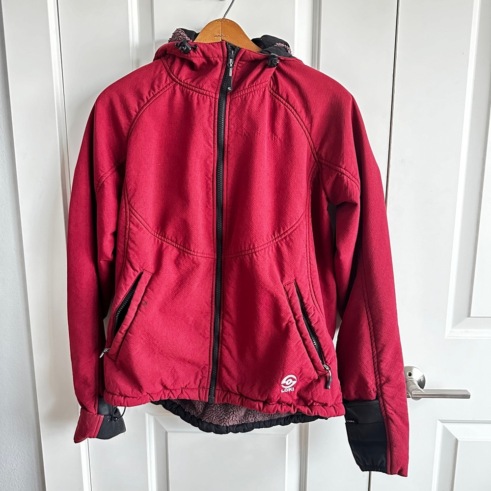 Women’s LOKI jacket. Fleece lined with signature built in mittens and mask.